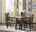 Bennox Dining Table and Chairs with Bench (Set of 6) on Sale